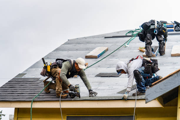 Professional Gutter Installation technician working in Bond, CO